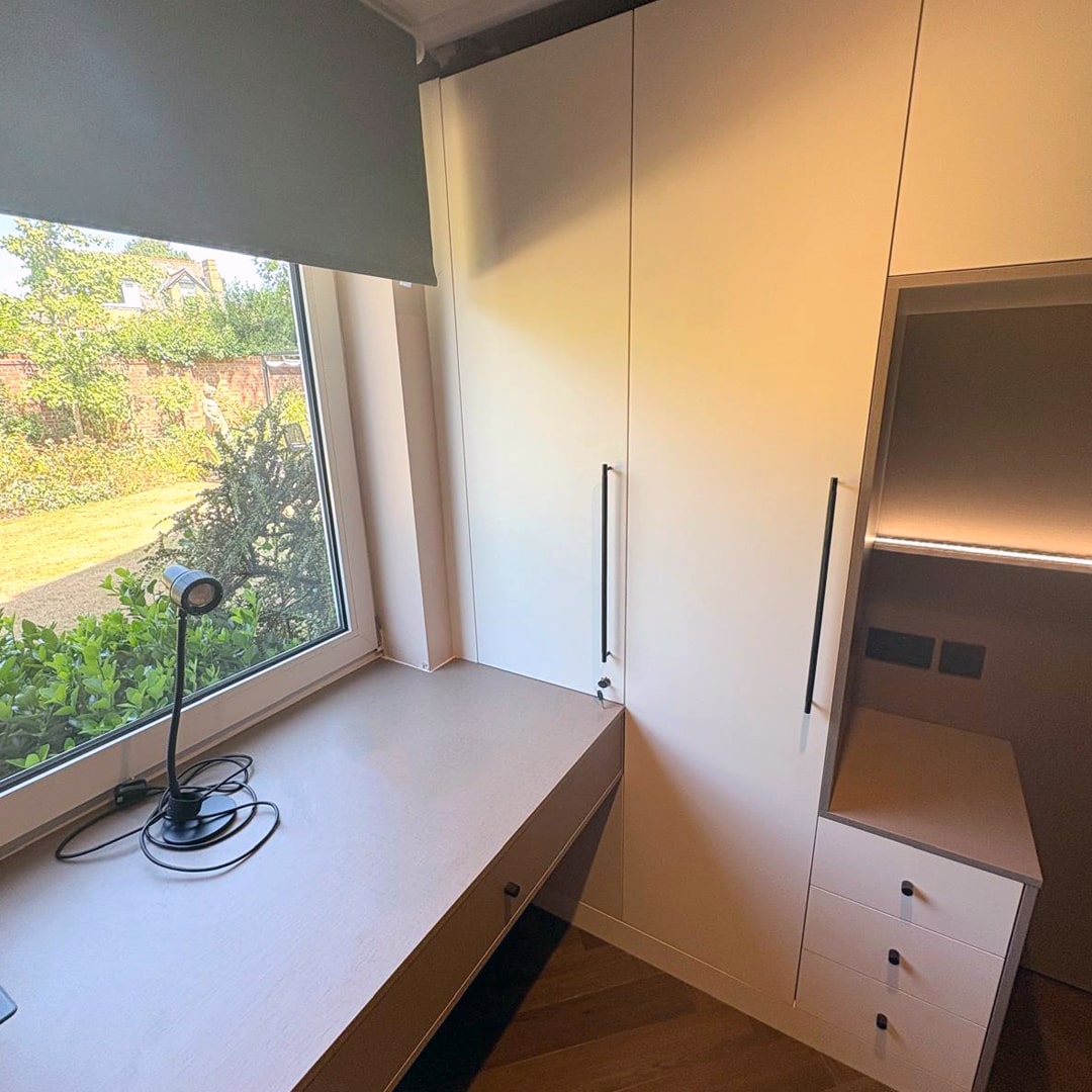 Modern overbed built-in wardrobes and bespoke desk by DAY & KNIGHT