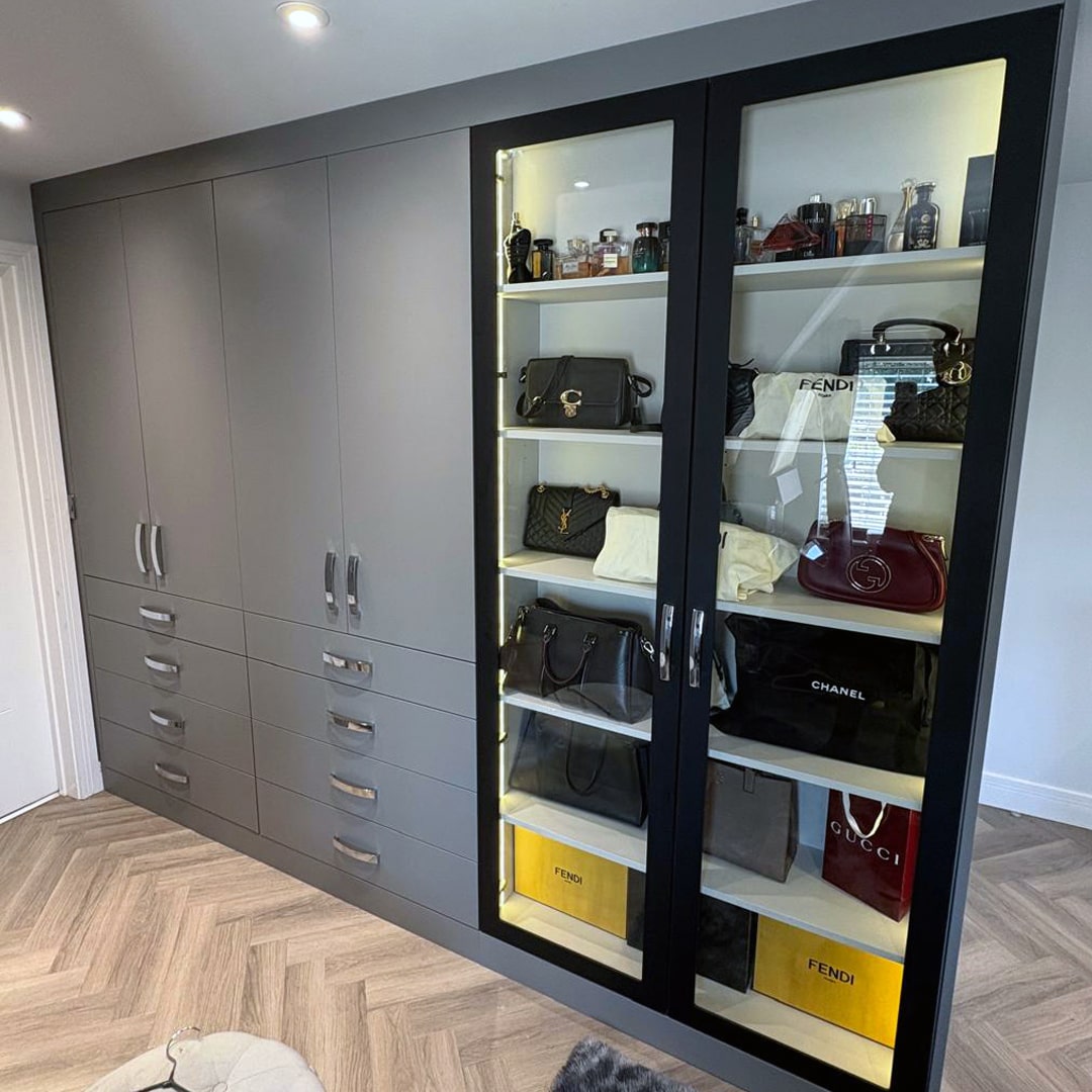 Complete fitted dressing room in Maidenhead with a display cabinet to showcase clients designer handbags