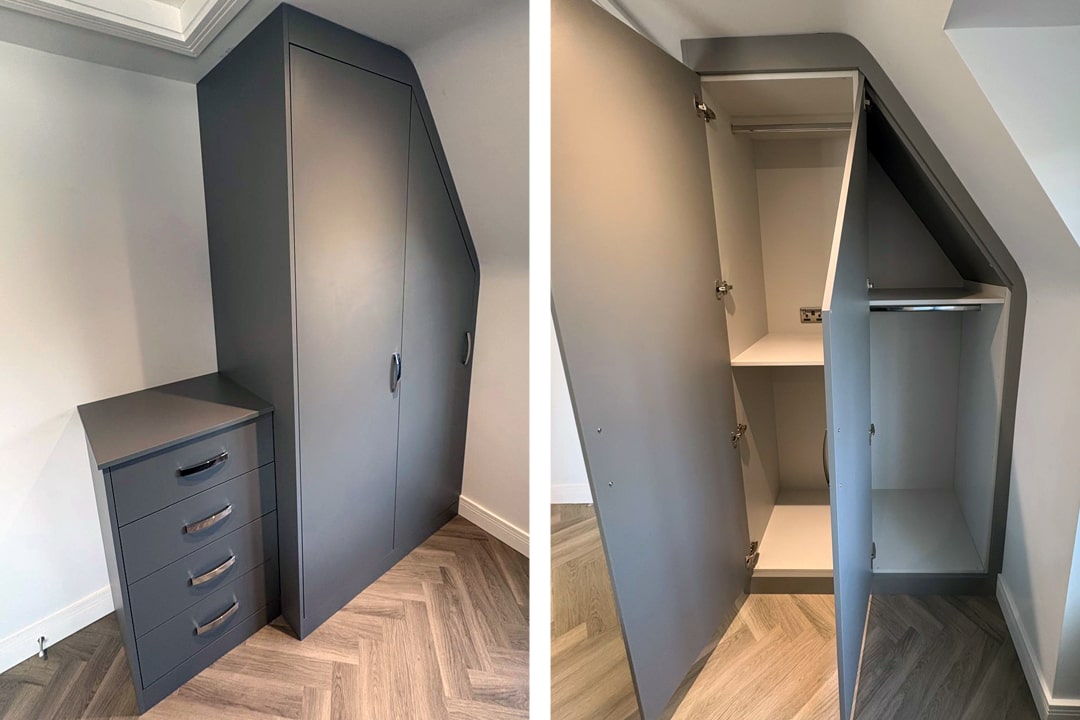 Basalt Grey fitted wardrobes under an angled ceiling  and four drawer side unit