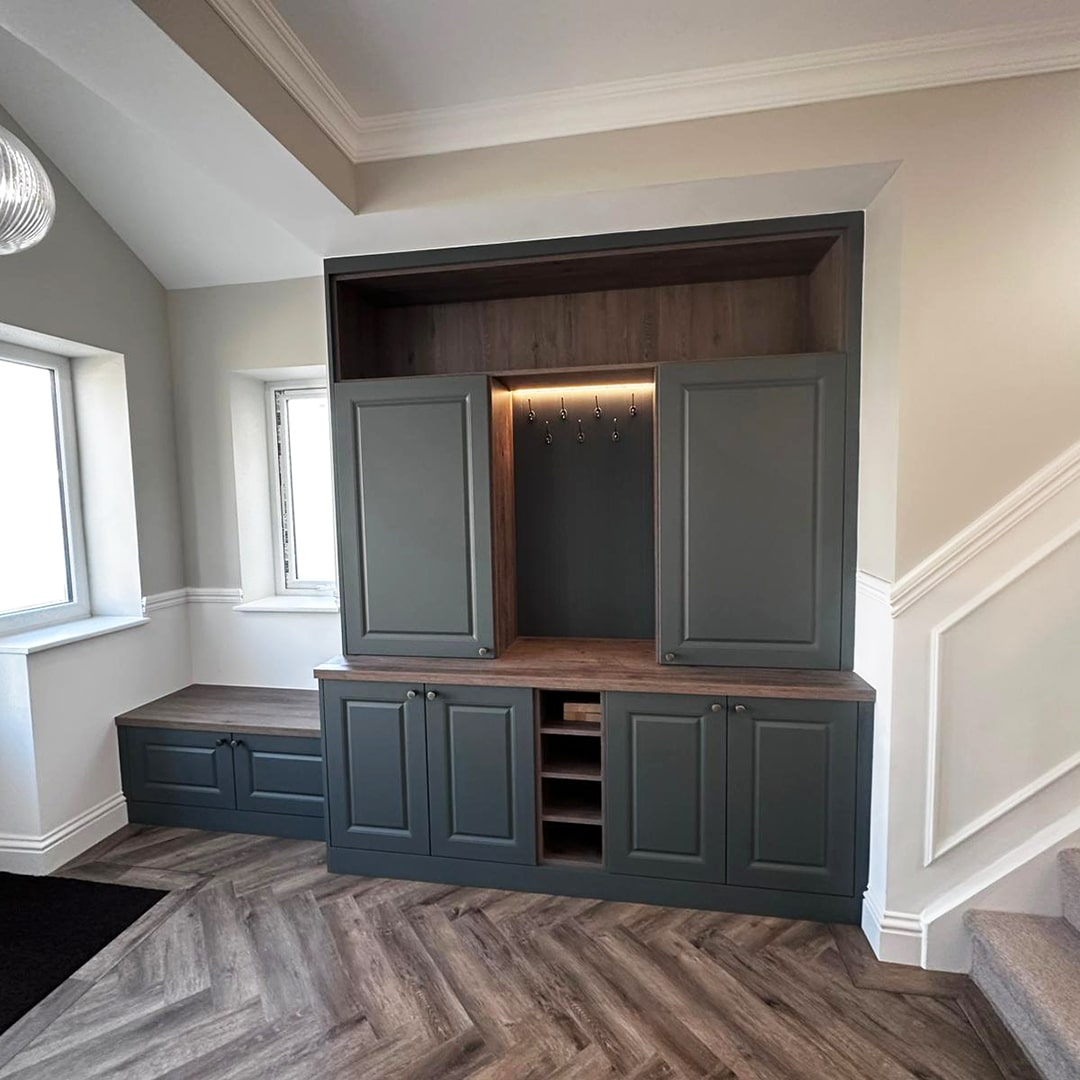 Stunning new shaker-style bespoke hallway boot room unit finished in a heritage green