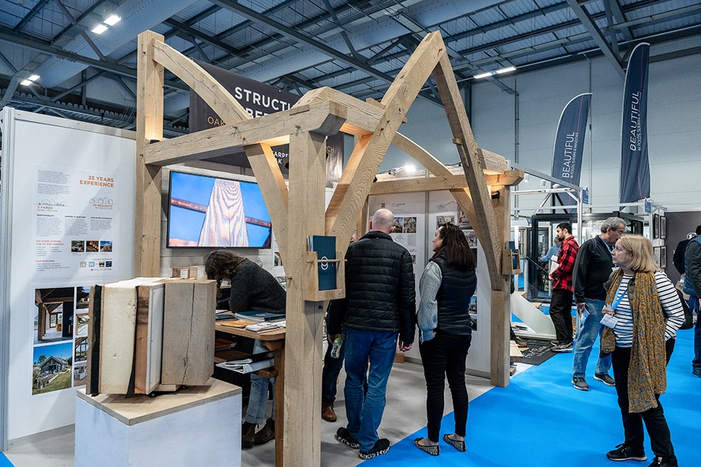 Large structural oak timber arches on display stand