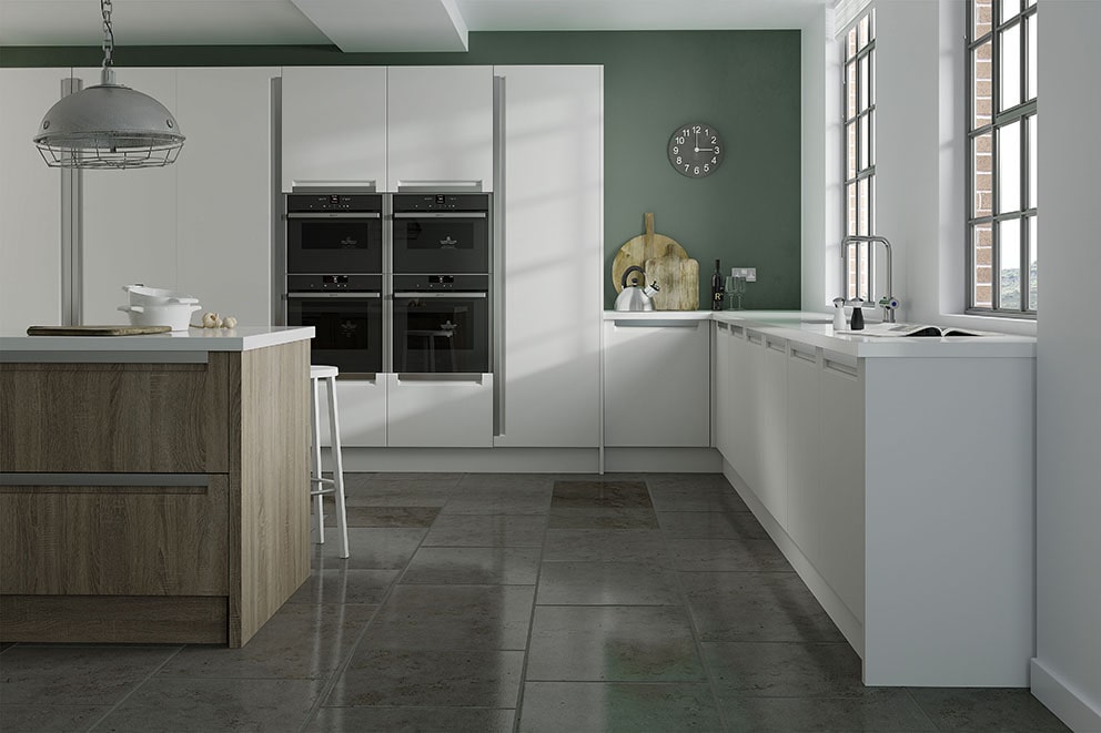 Open-plan kitchen design featuring island with Manhattan White and Sonoma Oak bespoke kitchen cupboards and quartz worktops
