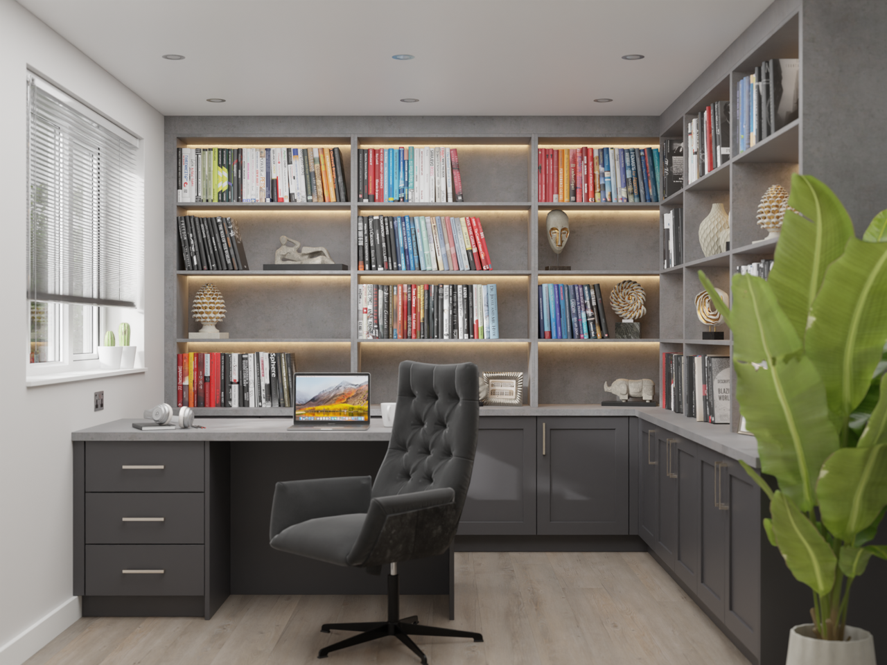 Grey fitted home office with lit bookcases
