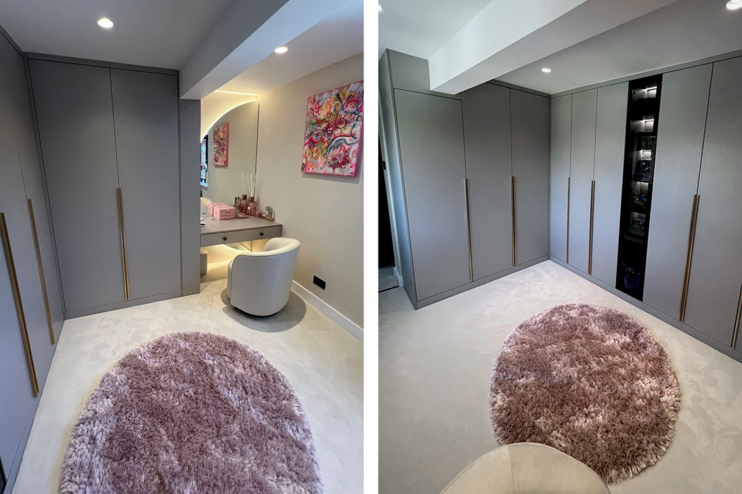 Grey fitted dressing room with a vanity, chair and pink rug