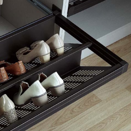 Pull-out shoe rack fitted inside a wardrobe
