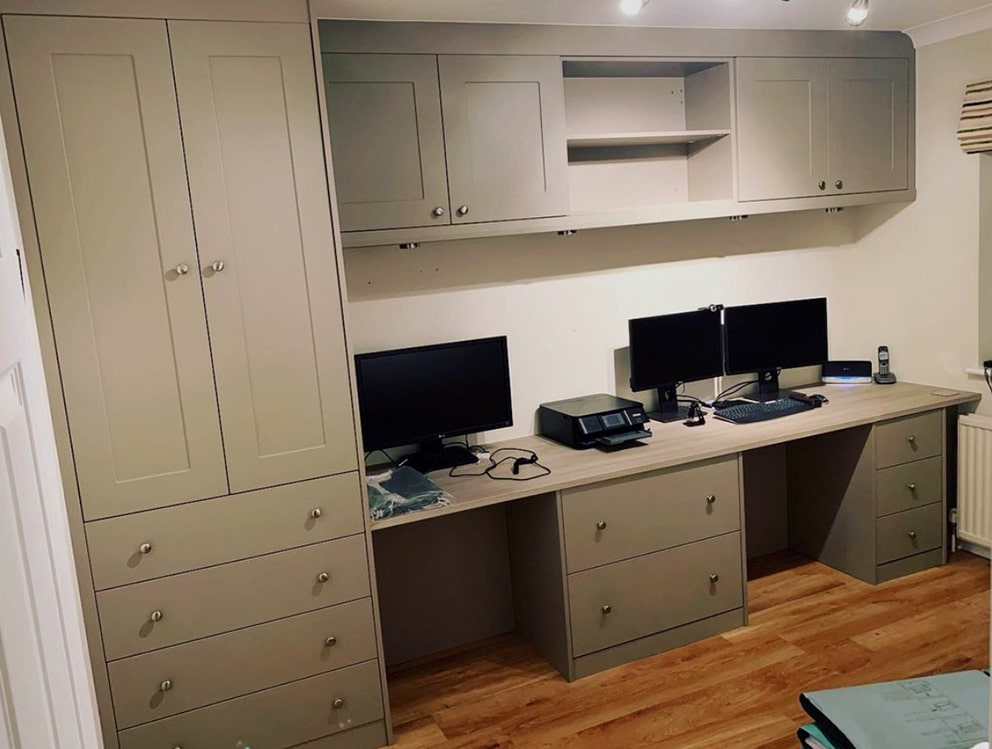 Stone grey fitted home office with twin desks and overhead cabinets